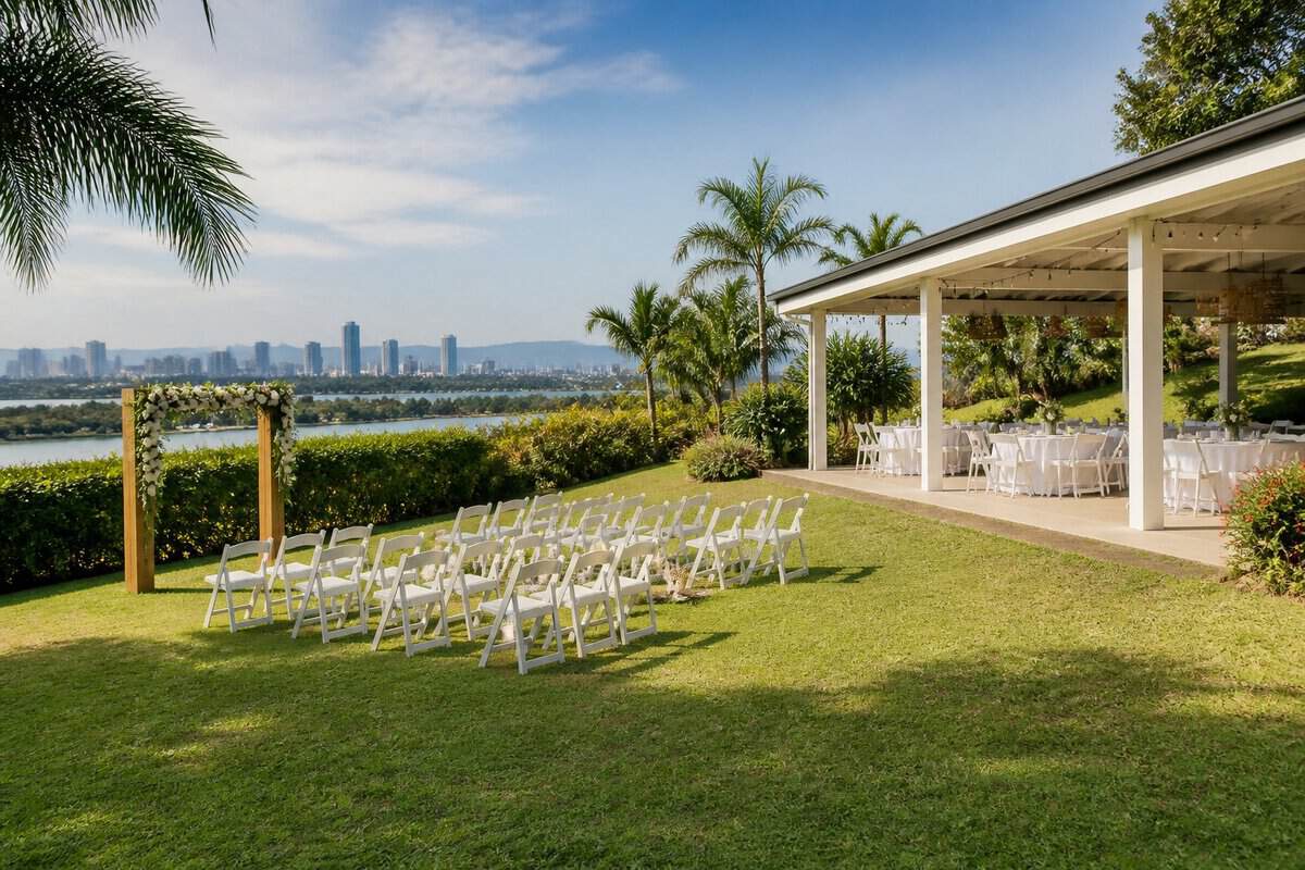 A simple elegant outdoor wedding setup on a lawn at a scenic Gold Coast venue.