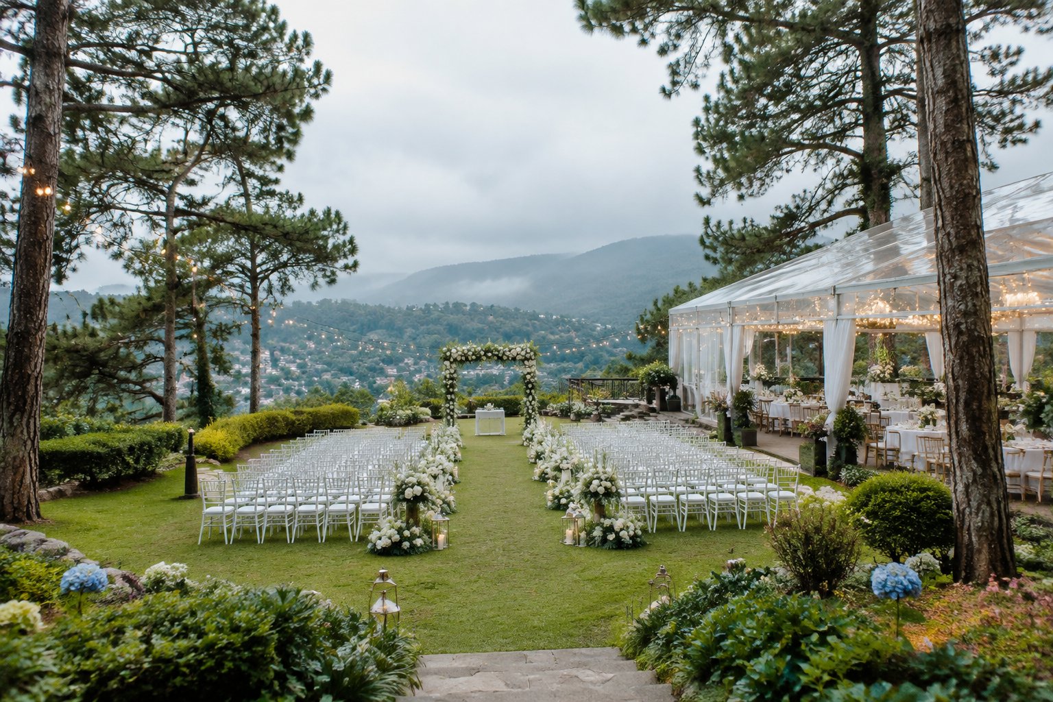 An elegant garden wedding venue surrounded by pine trees, flowers, and misty mountain scenery in Baguio City.