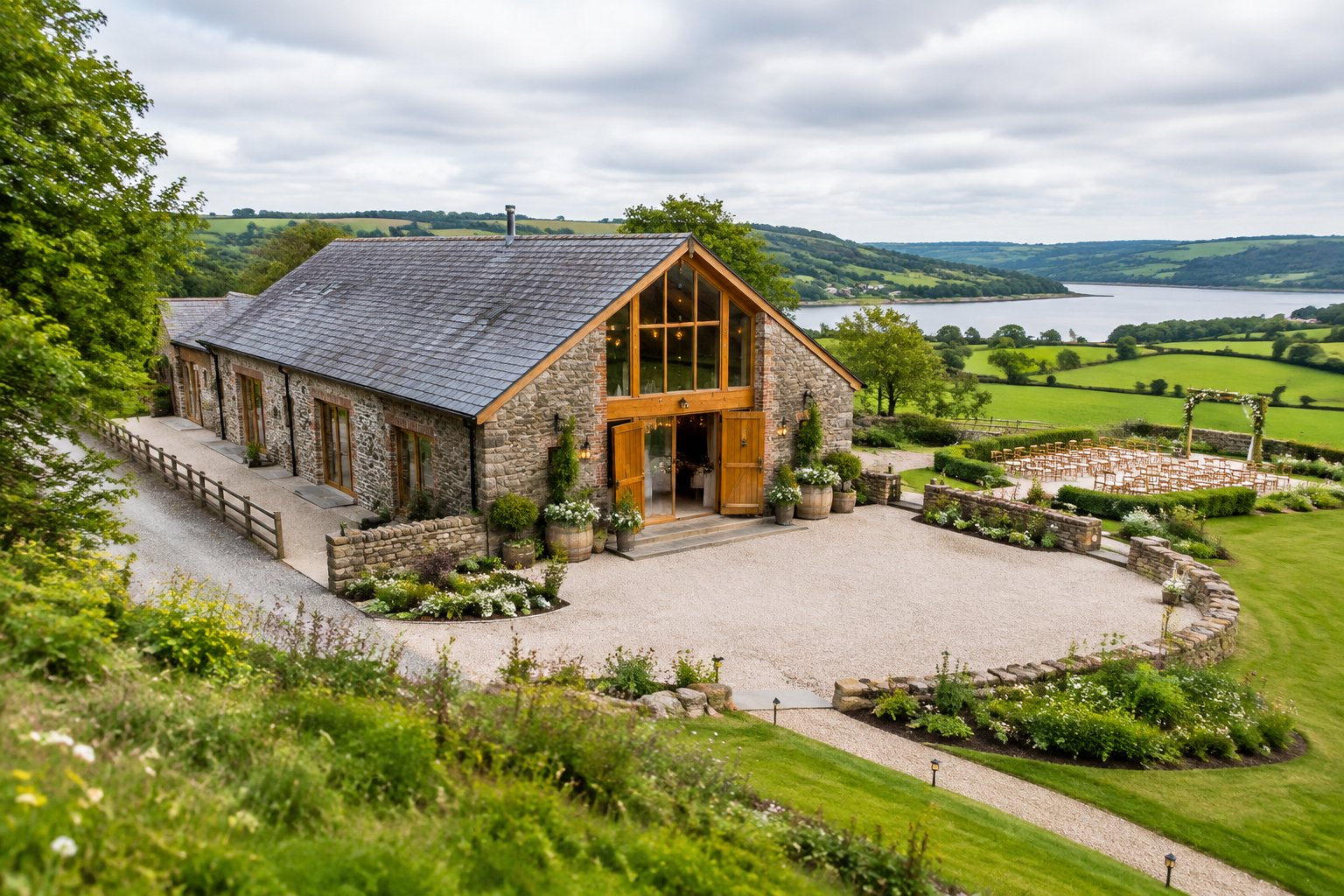 A rustic barn wedding venue surrounded by lush green Irish countryside.