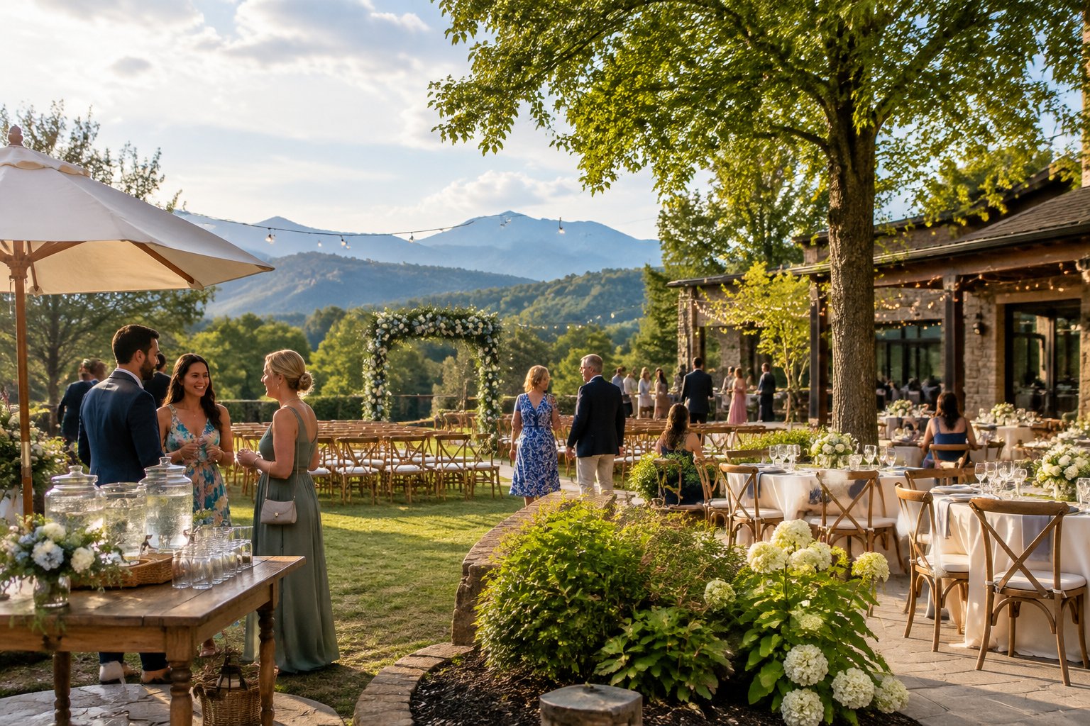 Guests gather at an elegant mountain wedding venue surrounded by forested hills.