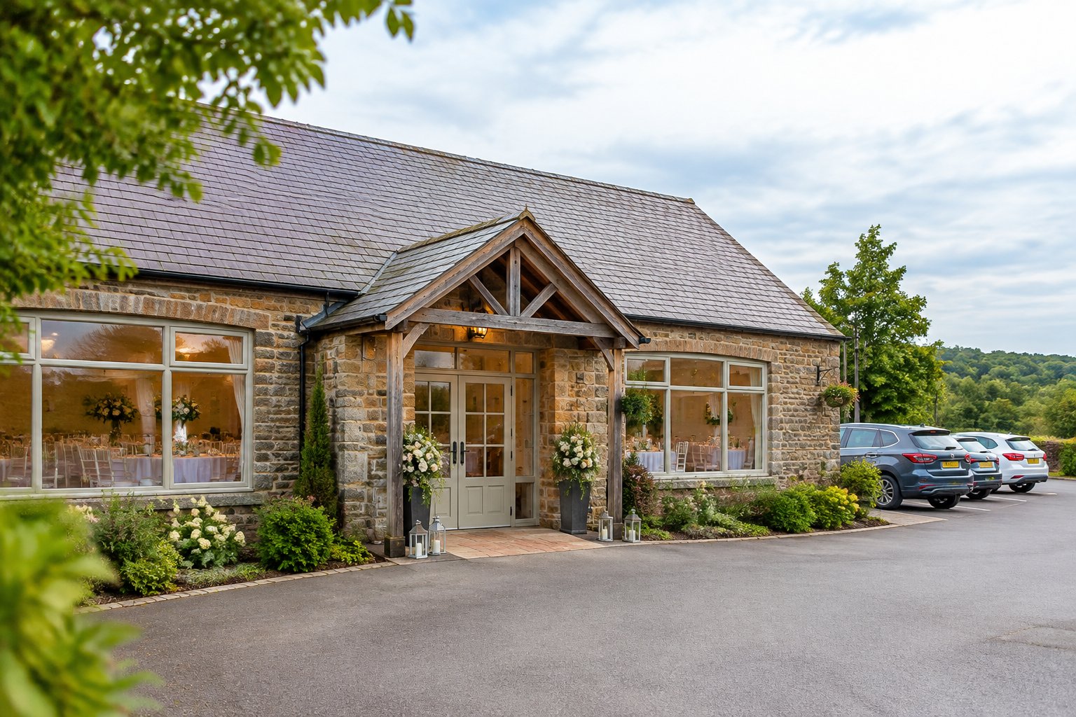 A modest local wedding venue with simple decorations and greenery outside.