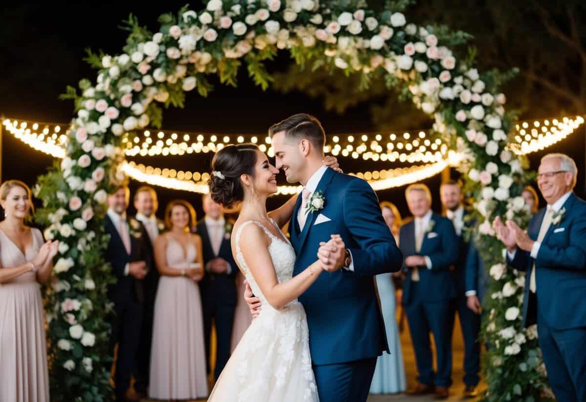 A couple dances under a flower-adorned arch, surrounded by smiling guests and twinkling lights