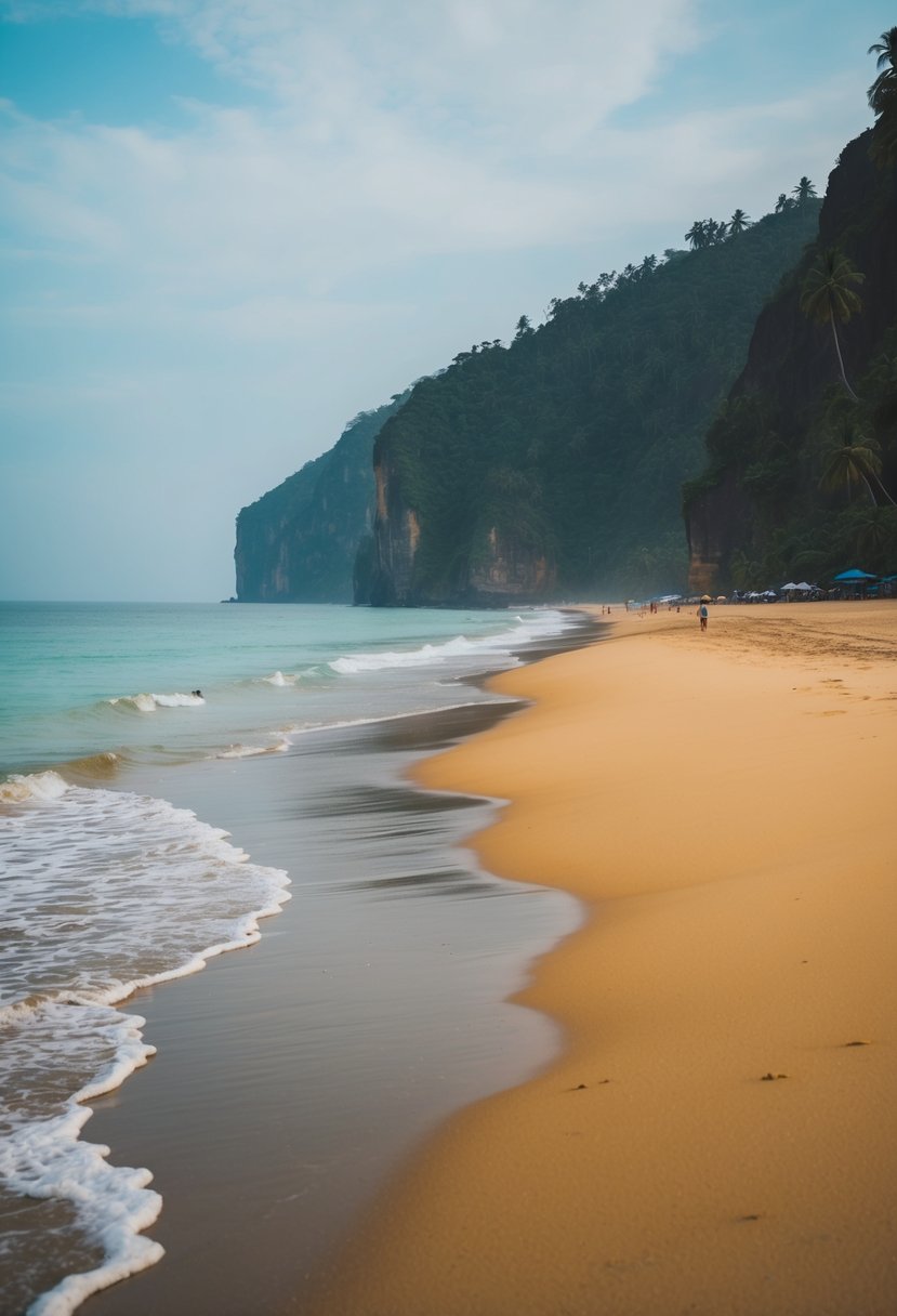 A serene beach at Varkala, Kerala with golden sand, turquoise waters, and a dramatic cliff backdrop