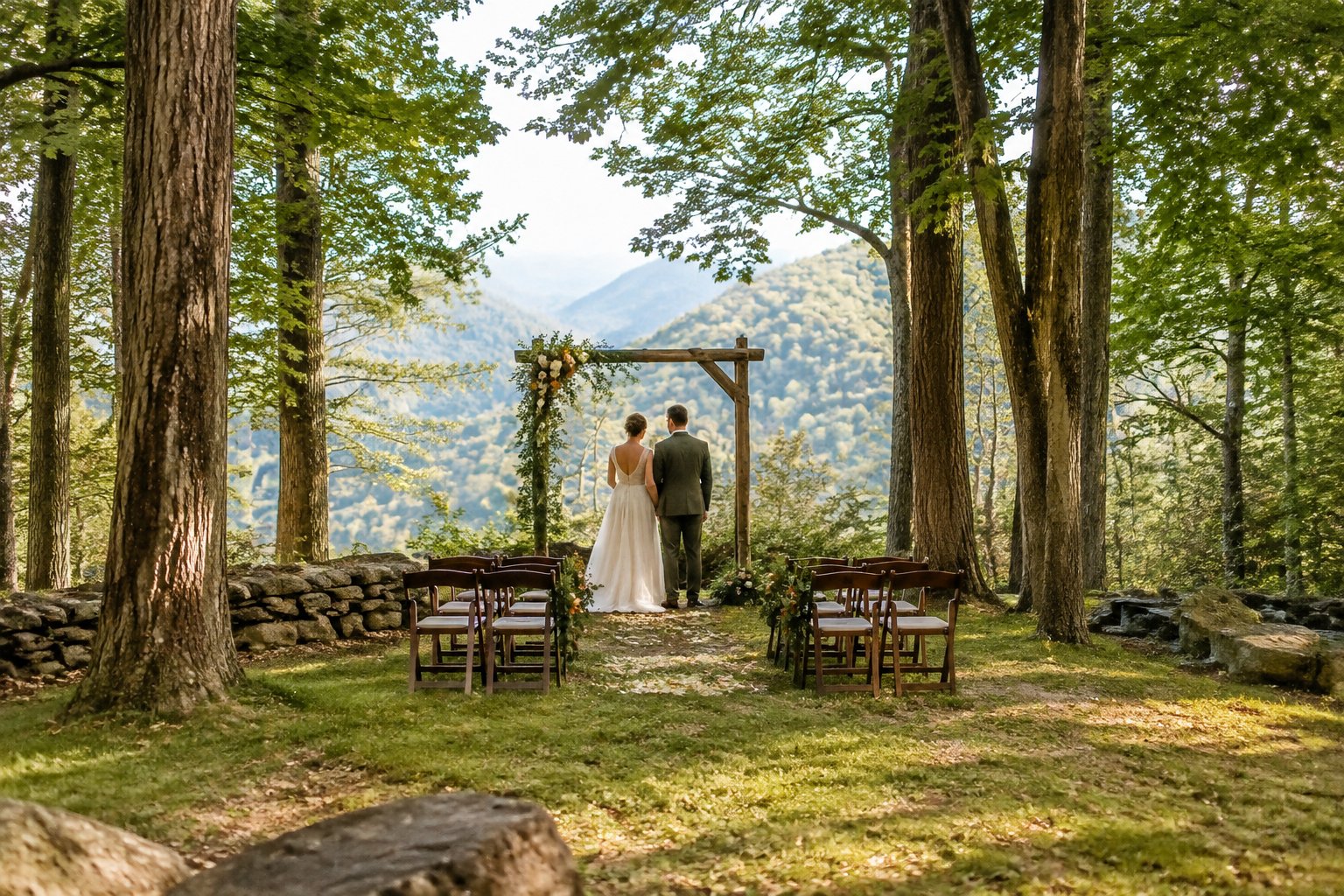 A couple stands beneath a flower-adorned arch at a small woodland wedding ceremony.