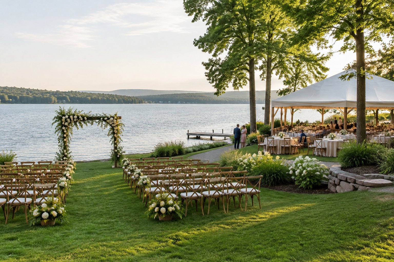 A lakeside wedding ceremony lawn and reception area beside a calm lake.